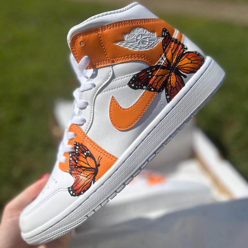 Custom Air Jordan 1 White And Orange Embellished With Butterflies