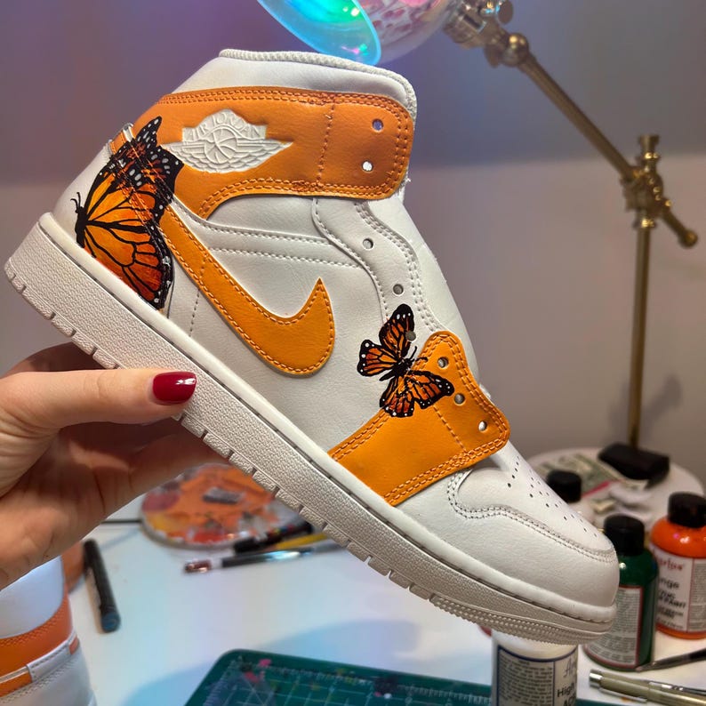Custom Air Jordan 1 White And Orange Embellished With Butterflies